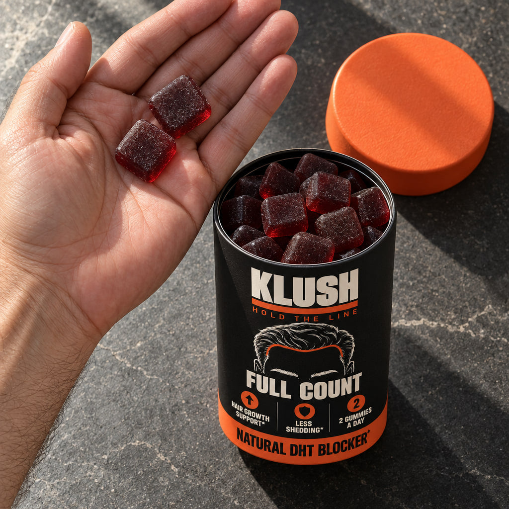 Two Full Count gummies in a hand over an open can